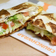 Taco Bell Crunchwrap Supreme on table
